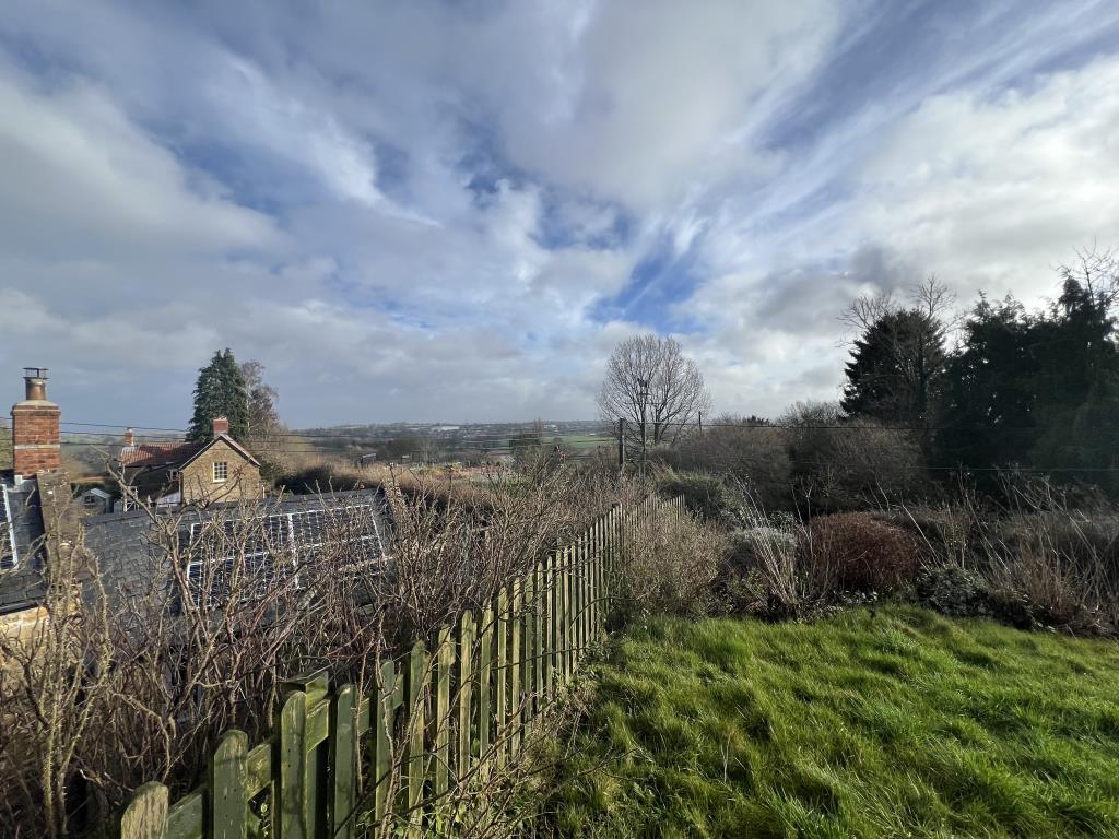 Lot: 131 - DETACHED COTTAGE FOR UPDATING - General view from rear garden